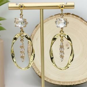 Brass charms dangle earrings